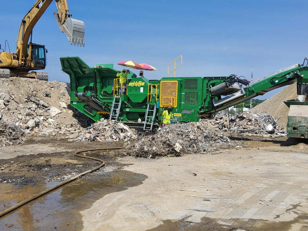 Demolition being done with large equipment by the Baltimore-based team at Gray & Son.