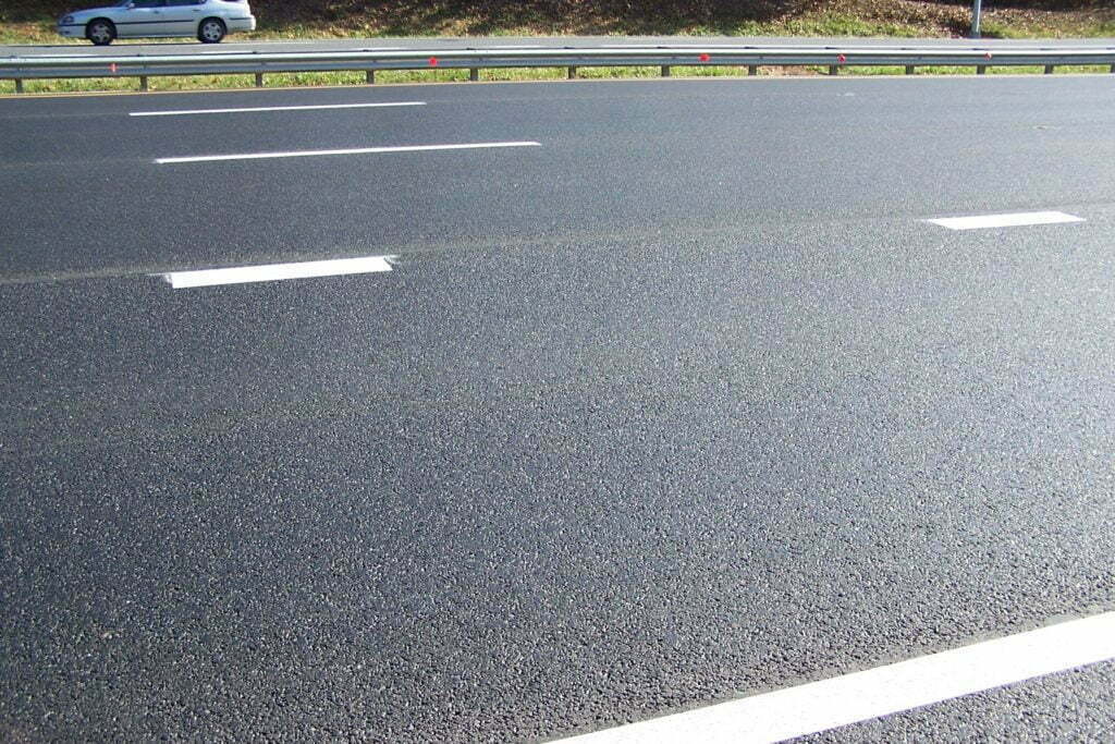 Road pavement representing RAP in an article about environmentally friendly products by Gray & Son and Maryland Paving.