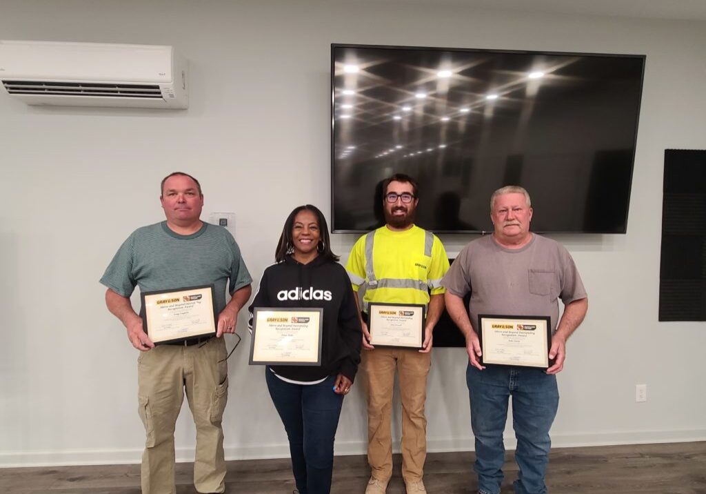 Gray & Son recognizes employees for work on the George Palmer Equipment Operator Simulation Training Room