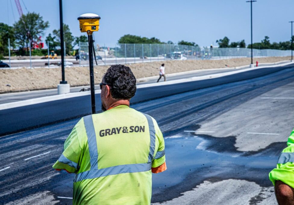 Gray & Son employee working on a paving project in Maryland